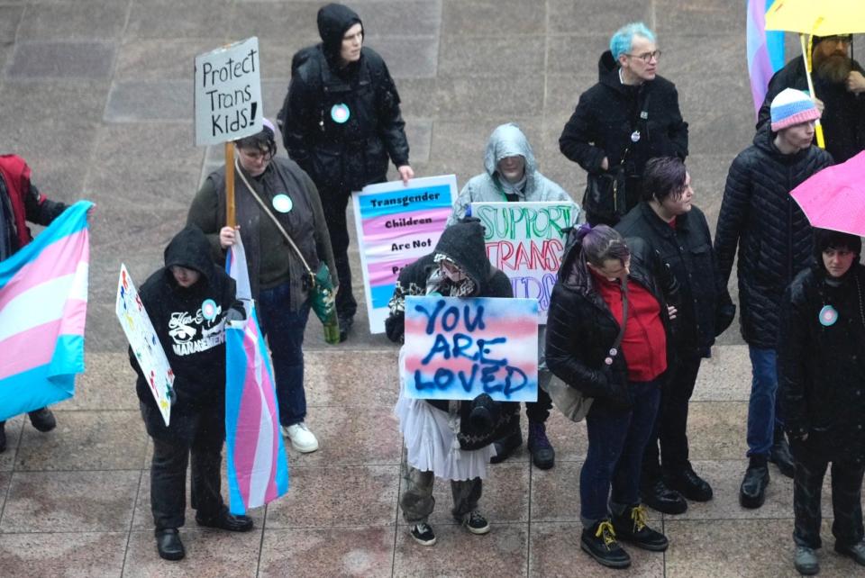 Protesters gather at the Ohio Statehouse on Jan. 24 ahead of the Ohio Senate's vote to override Gov. Mike DeWine's veto of House Bill 68.