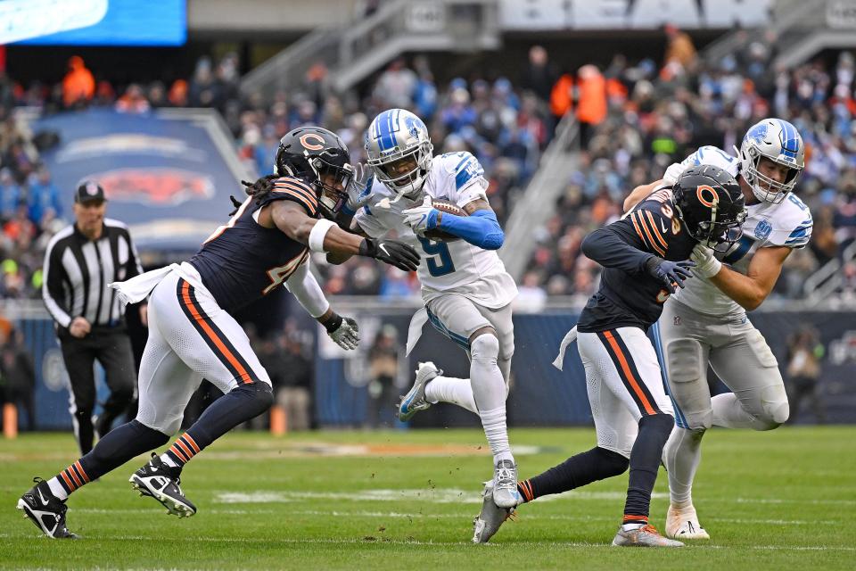 1845423058.jpg CHICAGO, ILLINOIS - DECEMBER 10: Jameson Williams #9 of the Detroit Lions is tackled by Micah Baskerville #47 of the Chicago Bears during the second quarter at Soldier Field on December 10, 2023 in Chicago, Illinois. (Photo by Quinn Harris/Getty Images)