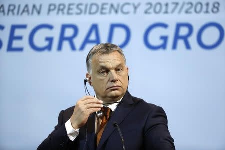 FILE PHOTO: Hungary’s Prime Minister Viktor Orban listens during a news conference in Budapest, Hungary, July 19, 2017. REUTERS/Bernadett Szabo