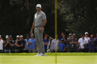 Dustin Johnson watches his putt on the 2nd green on the second day of competition of the WGC-Mexico Championship at the Chapultepec Golf Club in Mexico City, Friday, Feb. 22, 2019. (AP Photo/Marco Ugarte)