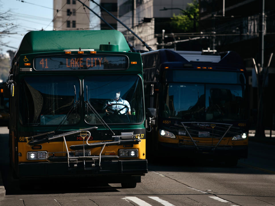A King County Metro bus driver pilots a bus down a quiet 3rd Avenue, the city&rsquo;s main bus corridor, when rush hour would normally begin before COVID-19 plagued the area, on April 8, 2020. (Photo: Grant Hindsley for HuffPost)