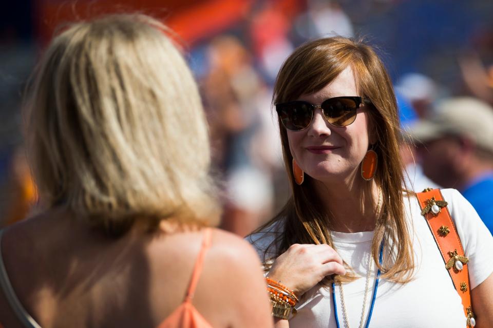 Tennessee Head Coach Jeremy Pruitt's wife Casey Pruitt stands on the field before a SEC game between the Tennessee Vols and Florida Gators in Gainesville, Fla. Saturday, Sept. 21, 2019.