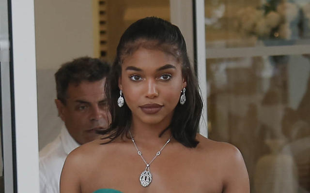 Lori Harvey Steps Out in Leggings & Fierce Louis Vuitton Boots