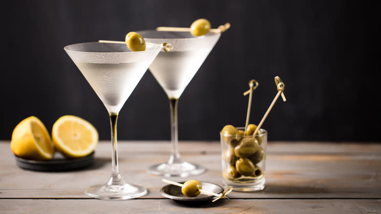 Cold Martini glasses with olives