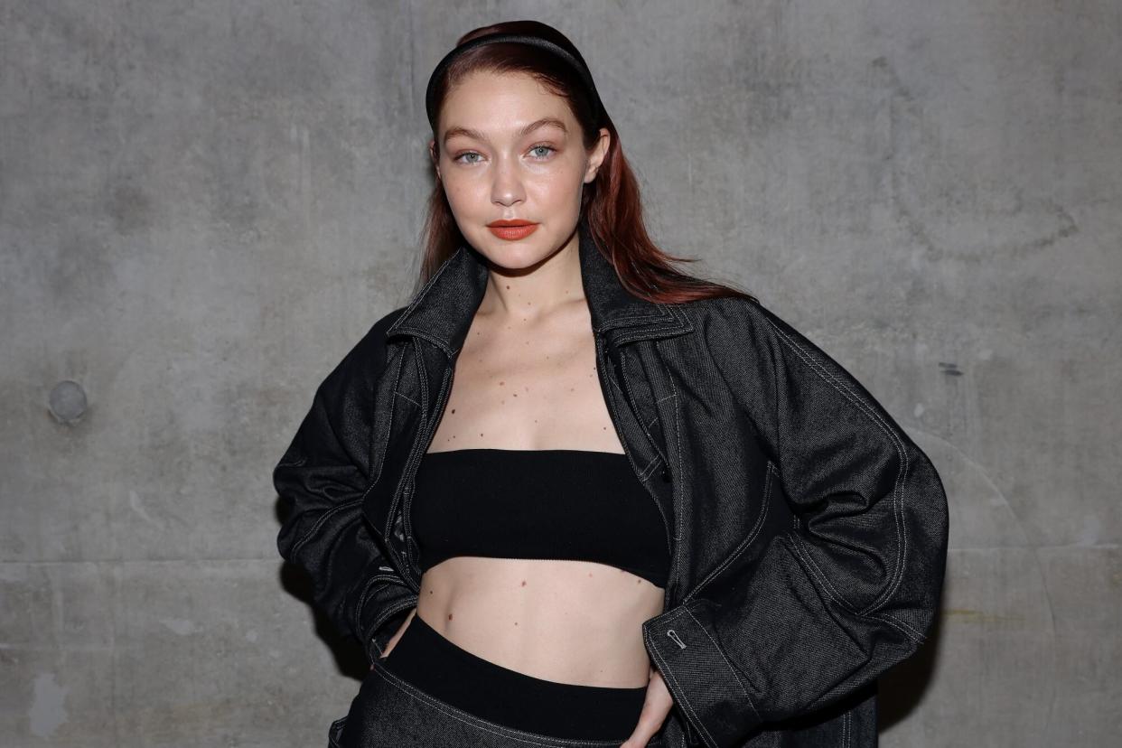 Gigi Hadid poses in the backstage of the Max Mara fashion show during the Milan Fashion Week