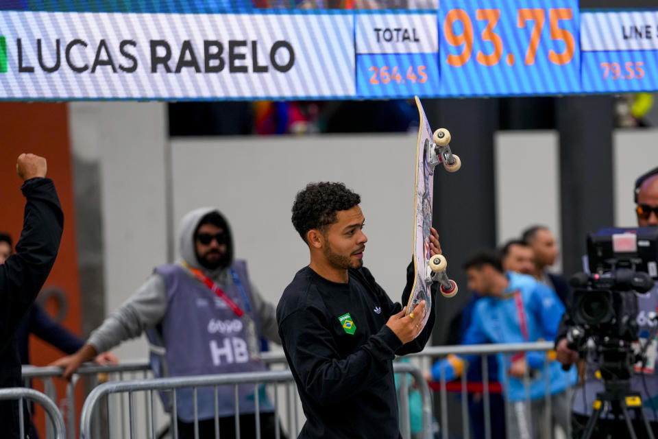 Brazil's Lucas Rabelo gestures while competing in the men's skateboarding street final at the Pan American Games in Santiago, Chile, Saturday, Oct. 21, 2023. (AP Photo/Esteban Felix)