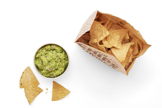 <p>Beth Galton/Chipotle Mexican Grill </p> Chipotle has a deal for free chips and guac on its app.