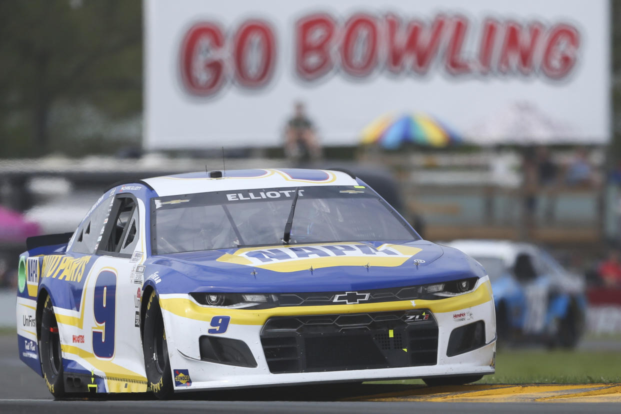 Chase Elliott drives through the Bus Stop during a NASCAR Cup Series auto race in Watkins Glen, N.Y., on Sunday, Aug. 8, 2021. (AP Photo/Joshua Bessex)