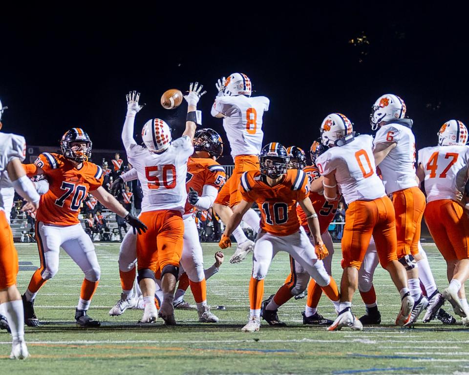 Brighton's Nick Thalacker (50) blocks a 29-yard field goal attempt with 26 seconds left, preserving a 17-14 victory over Northville on Friday, Sept. 23, 2022.