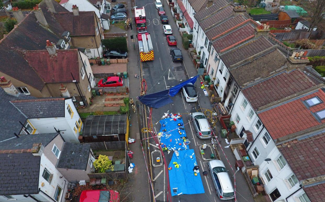 Emergency services at the scene of the fire in Sutton, south London, in December 2021