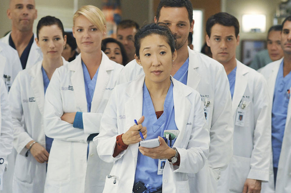 the group of nurses and doctors standing together