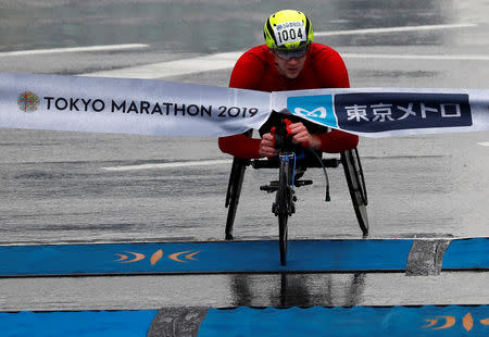 Daniel Romanchuk of the U.S. corsses the finish line, winning second place, at the men's wheelchair division at Tokyo Marathon 2019 in Tokyo, Japan March 3, 2019. REUTERS/Issei Kato