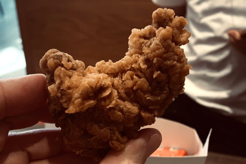 A chicken wing shaped like a rooster