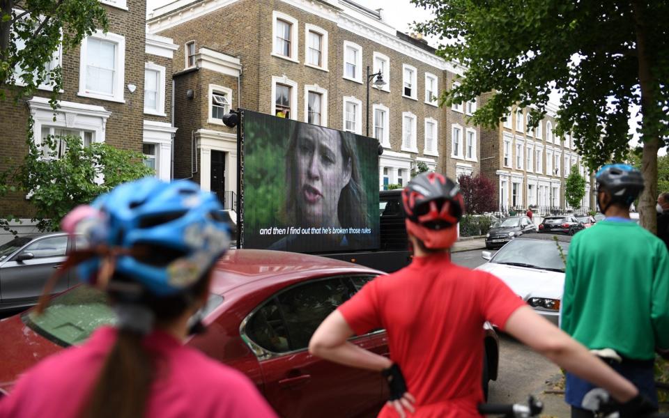 A video screen installed by political campaigners in the street outside the home of Dominic Cummings -  Peter Summers/Getty Images Europe