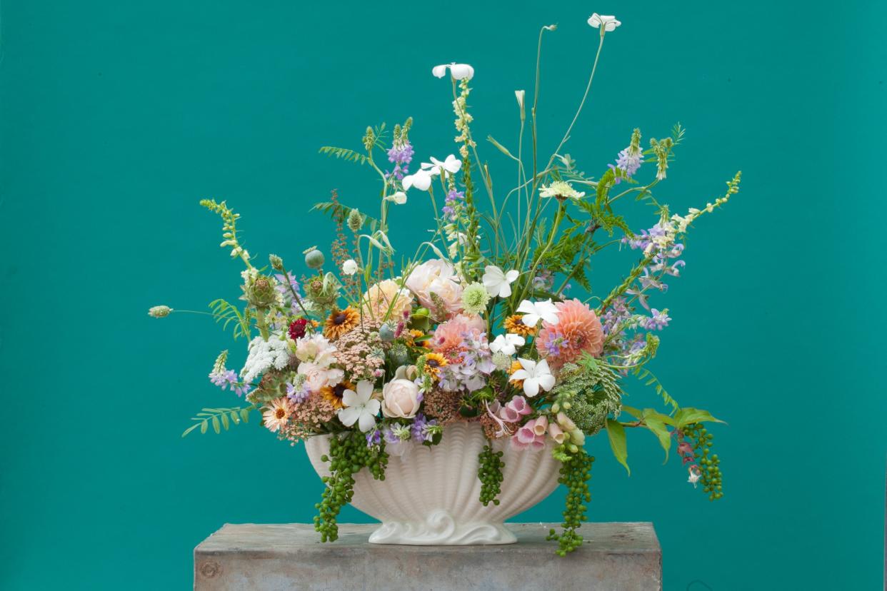 <p>Buckets of fun: Wolves Lane Flowers is gearing up to offer bouquets and subscription services</p> (Nick Selby)