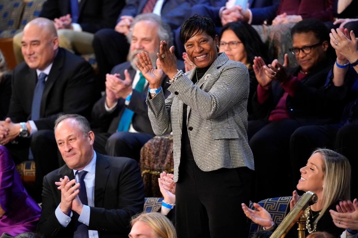 Saria Gwin-Maye, of Cincinnati, stands as she is recognized by President Joe Biden during the State of the Union on Tuesday.