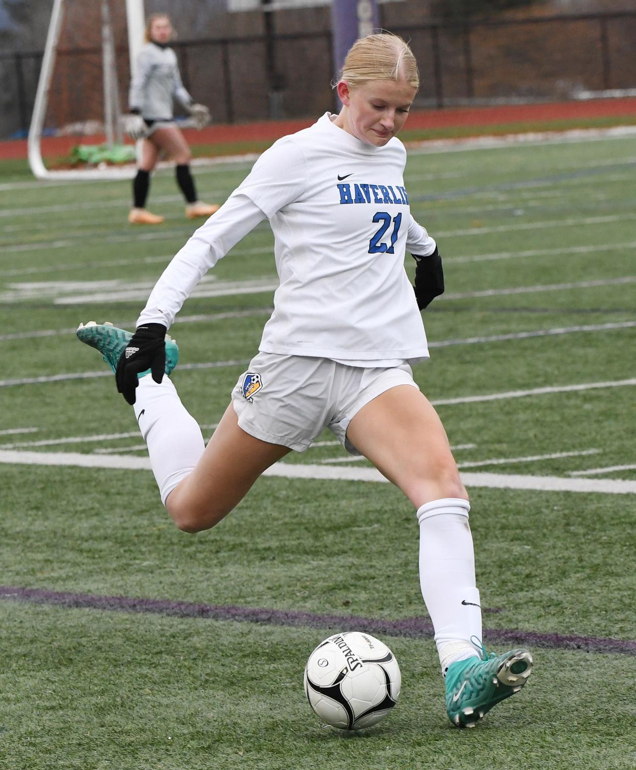 Keegan Smith of Haverling boots the ball toward the offensive zone for the Rams.