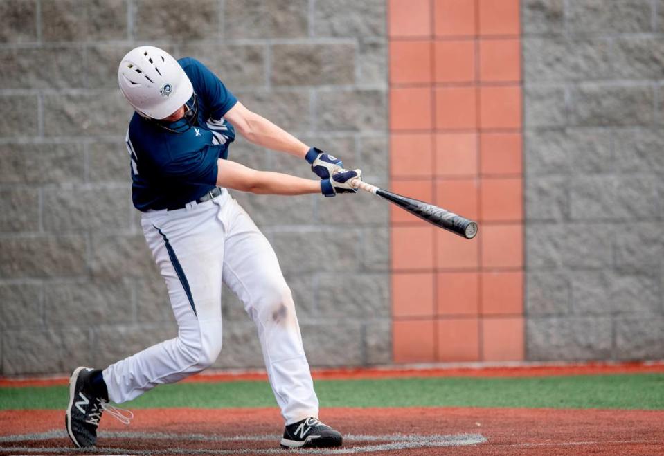 Penns Valley’s Dakota Brodzina hits a double that scores a run during the game against Punxsutawney PIAA playoffs at Showers Field in DuBois. Punxsutawney won, 8-2.