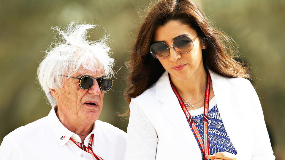 Former F1 boss Bernie Eccleston talks and walks with his wife Fabiana.