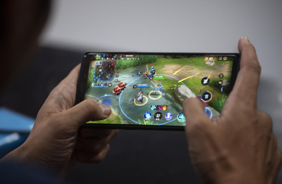 HONG KONG, CHINA - 2019/07/28: A competitor plays mobile game during the E-Sports and Music Festival Hong Kong. (Photo by Budrul Chukrut/SOPA Images/LightRocket via Getty Images)