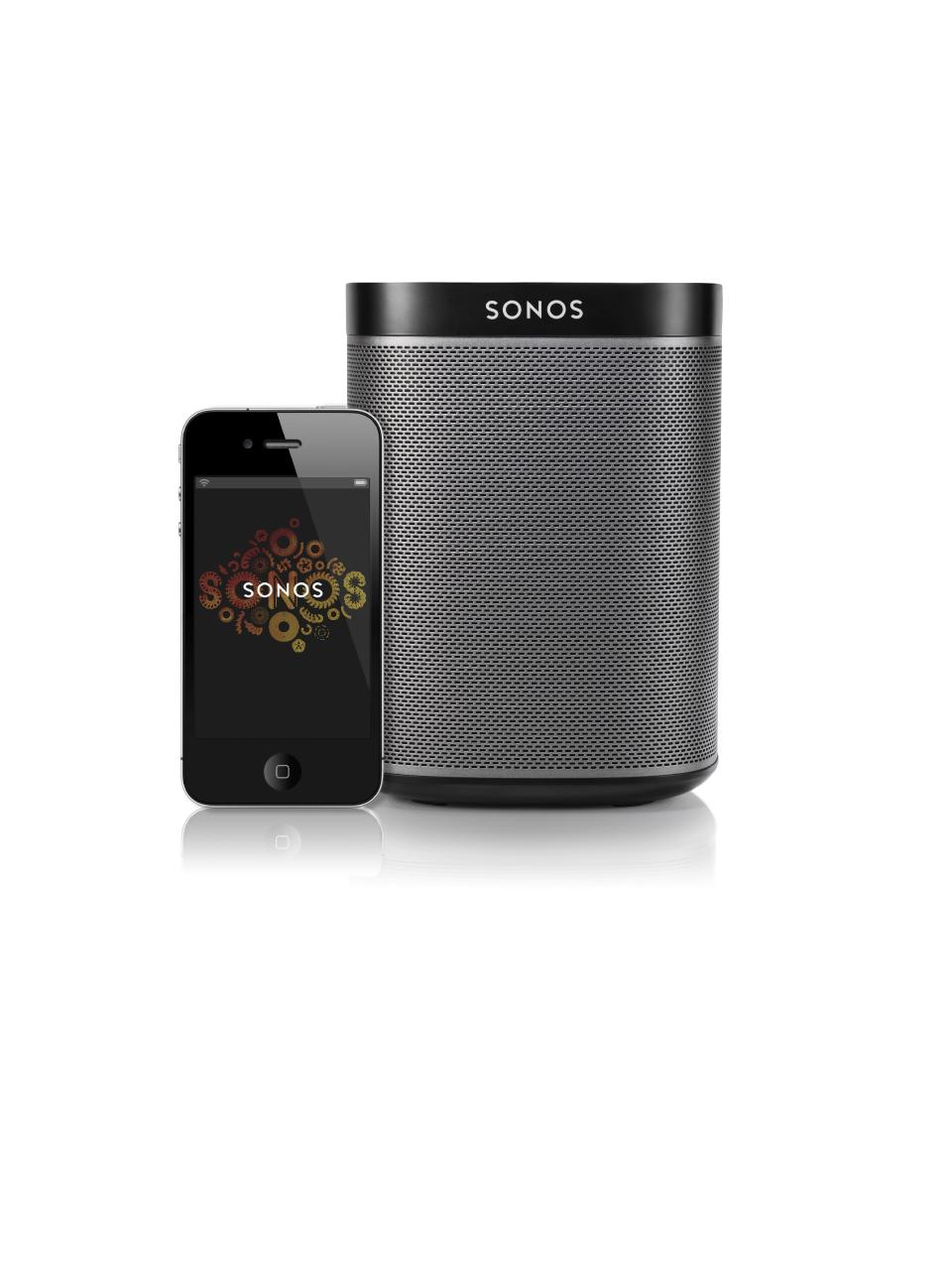 This photo provided by Sonos shows an iPhone and Sonos Black Play 1. Sonos speakers run over Wi-Fi and need to be plugged into a power outlet. The speakers are designed to disperse sound in a wide radius and fill a room with sound. (AP Photo/Sonos)