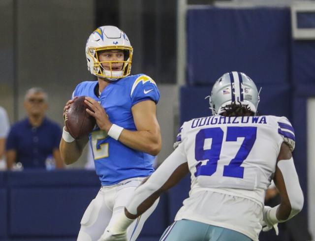 Easton Stick of the Los Angeles Chargers looks to pass during the