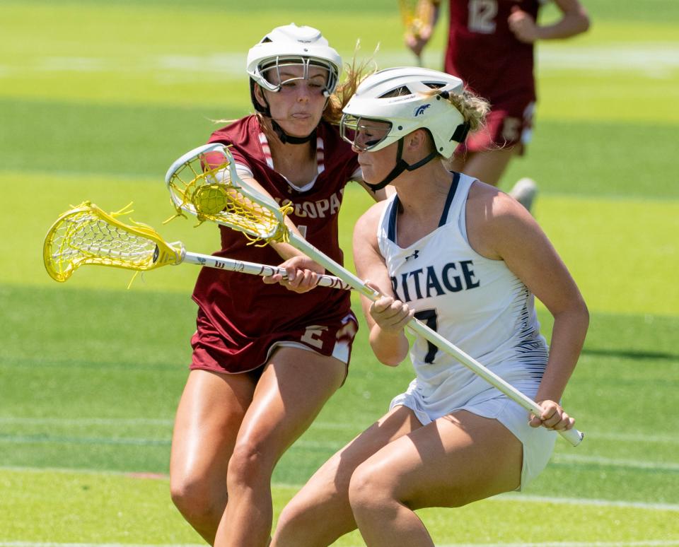 Brooke Goldstein of American Heritage fights off an Episcopal defender during their Class 1A state semifinal game in Naples on Friday, May 10, 2024. Photo by Darron R, Silva/Special to USA Today Network-Florida