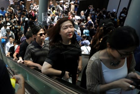 Demonstrators arrive at the Admiralty station of Mass Transit Railway (MTR) to attend a protest in Hong Kong