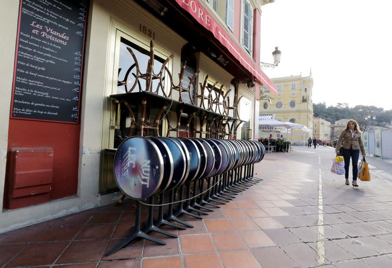 FILE PHOTO: Tables and chairs are seen on the terrace of a restaurant as France's Prime Minister announced to close most all non-indispensable locations due to concerns over the coronavirus disease (COVID-19), in Nice