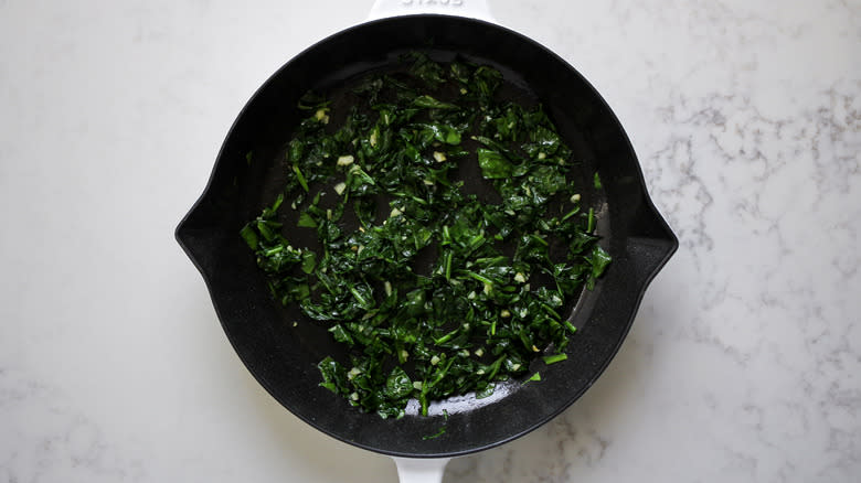 chopped spinach in skillet