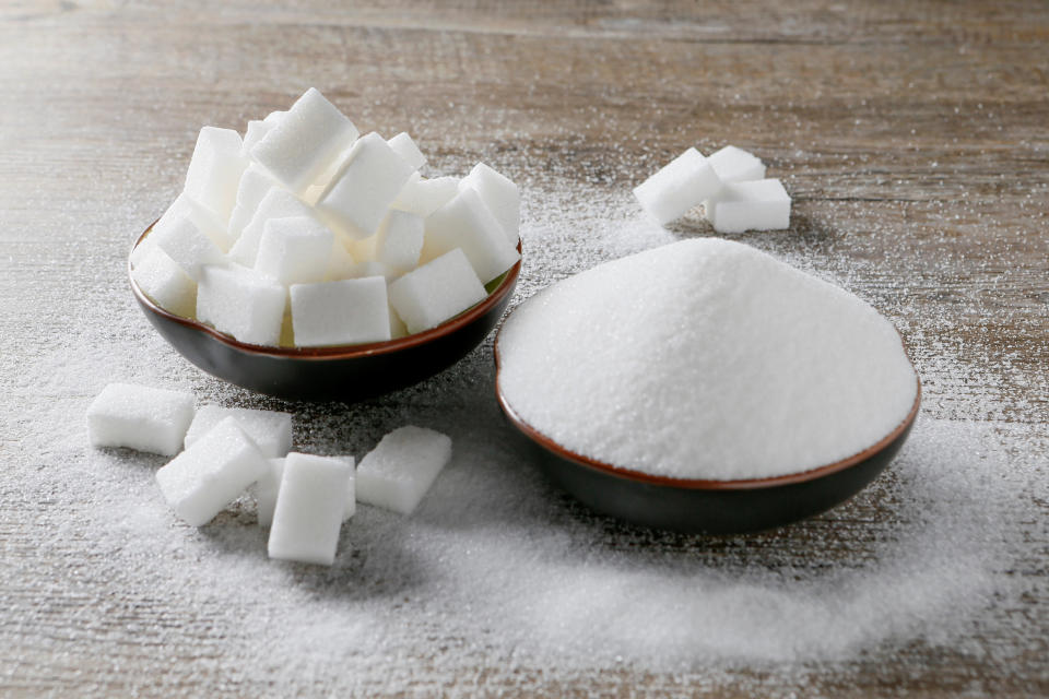 Granulated white sugar and sugar cubes are seen in this picture illustration taken December 16, 2018. REUTERS/Emmanuel Foudrot/Illustration