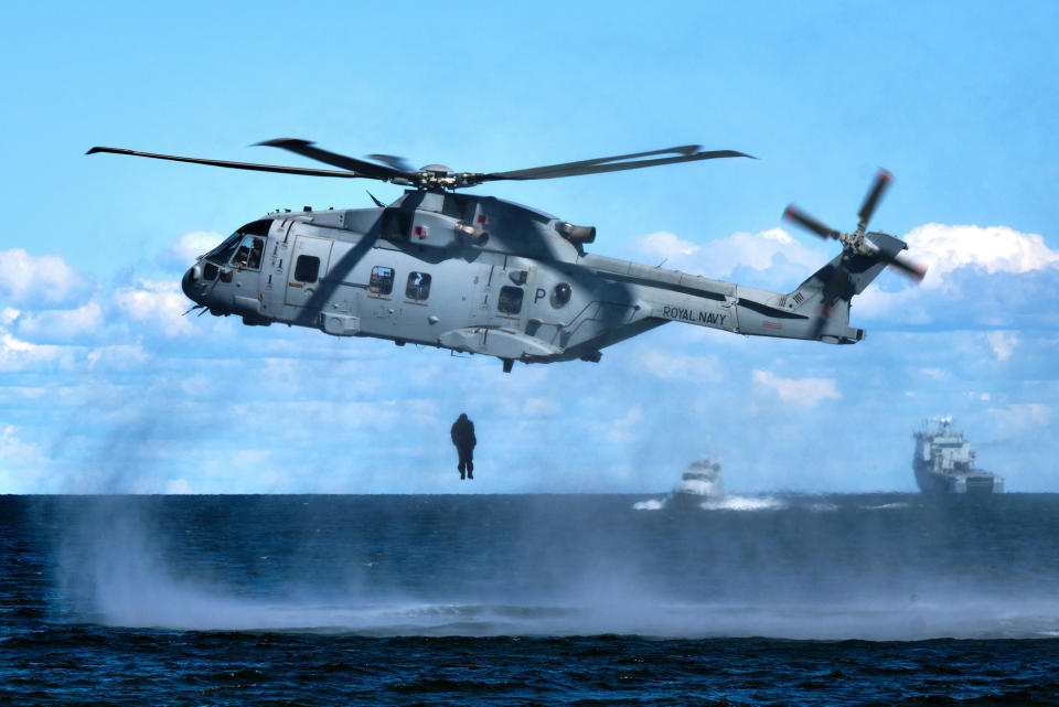 Image of a Royal Marine from 4 Assault Squadron, HMS Albion, jumping (Helocasting) from a Merlin helicopter into the sea to link up with inflatable raiding craft during an amphibious landing exercise taking place at Kolga Bay, Estonia (Picture: UK MOD/Crown 2019)