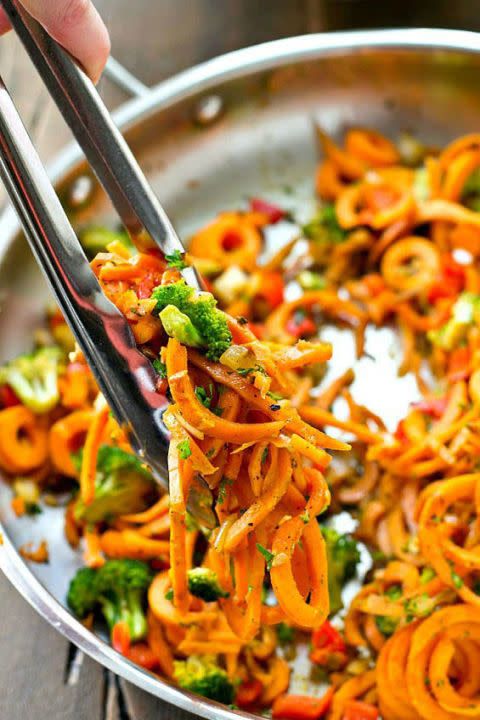<p>Noodles are great, but <a rel="nofollow noopener" href="http://www.drozthegoodlife.com/healthy-food-nutrition/healthy-recipe-ideas/tips/g423/sweet-potato-recipes/" target="_blank" data-ylk="slk:sweet potatoes;elm:context_link;itc:0;sec:content-canvas" class="link ">sweet potatoes</a> are better. Sub in some veggie pasta and you won't even notice a difference.</p><p>Grab the recipe from <a rel="nofollow noopener" href="http://wholeandheavenlyoven.com/2016/04/22/vegetarian-sweet-potato-noodles-stir-fry/" target="_blank" data-ylk="slk:Whole and Heavenly Oven;elm:context_link;itc:0;sec:content-canvas" class="link ">Whole and Heavenly Oven</a>.</p>