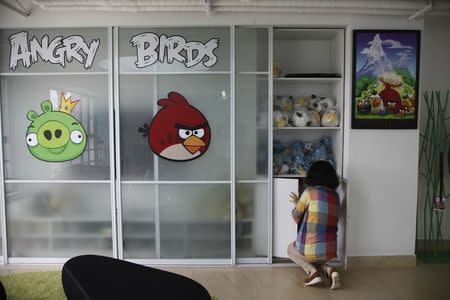 An employee works inside an office of Rovio, the company which created the video game Angry Birds, in Shanghai June 20, 2012. REUTERS/Aly Song