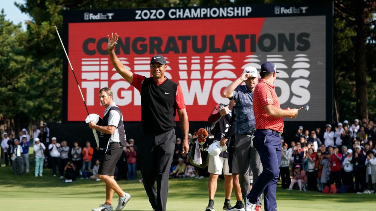 Mandatory Credit: Photo by Lee Jin-man/AP/Shutterstock (10458744a)Tiger Woods of the United States celebrates after winning the Zozo Championship PGA Tour at the Accordia Golf Narashino country club in Inzai, east of Tokyo, JapanGolf Zozo Championship, Inzai, Japan - 28 Oct 2019.