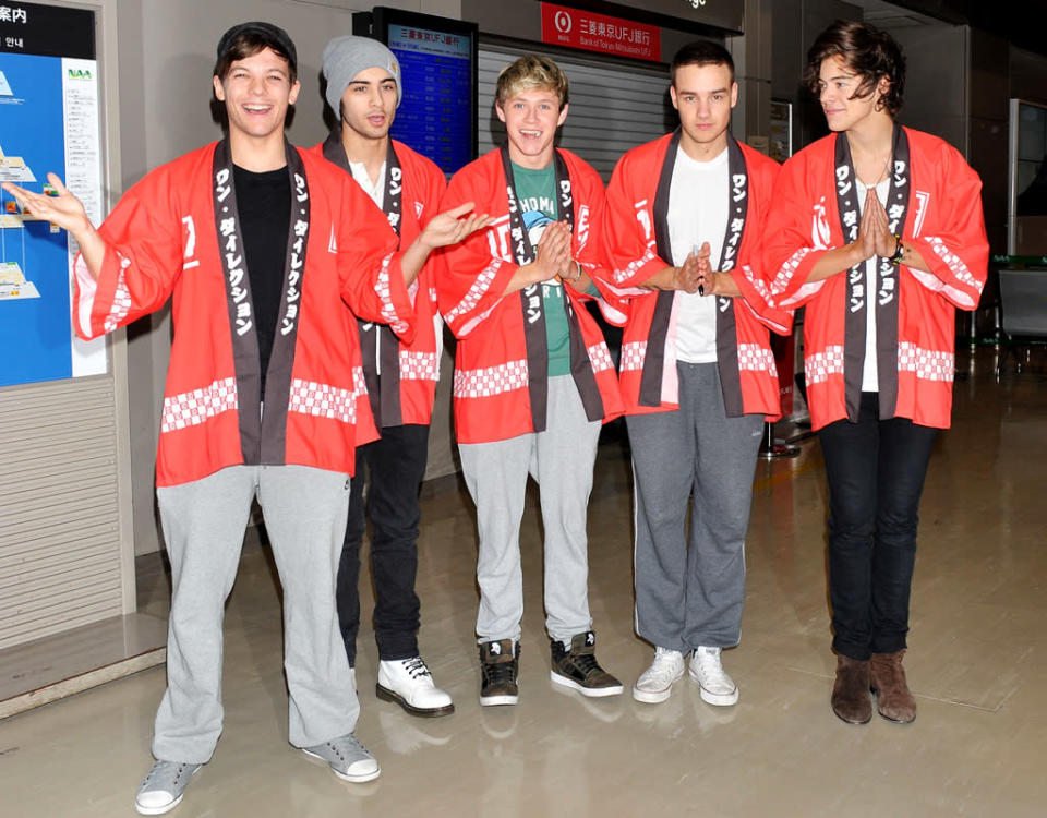 Konichiwa, One Direction! The hugely-popular British boy band – from left to right: Louis Tomlinson, Zayn Malik, Niall Horan, Liam Payne, and Harry Styles – touched down in Tokyo, Japan, on Thursday to throngs of screaming fans. And despite the weariness of their 11-hour flight from the U.K., they quickly acclimated to local customs, donning bright red kimonos and bowing for photographers awaiting them at Narita International Airport. (1/17/2013)