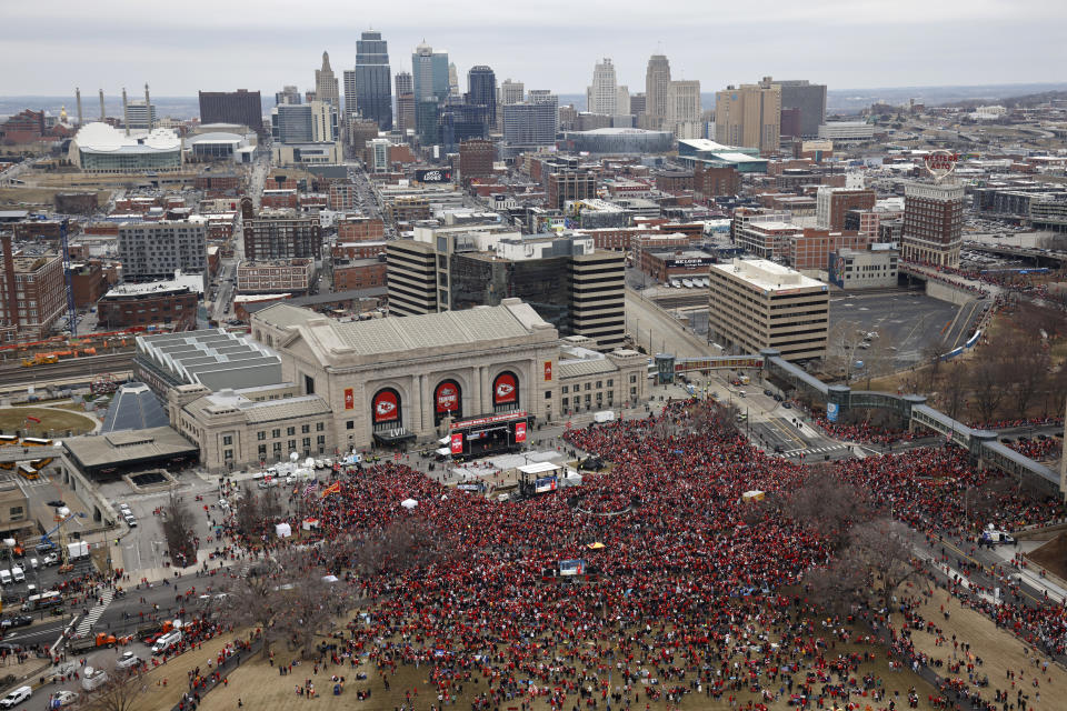 Fans wait in front of the Union Station before the Kansas City Chiefs' victory celebration and parade in Kansas City, Mo., Wednesday, Feb. 15, 2023, following the Chiefs' win over the Philadelphia Eagles Sunday in the NFL Super Bowl 57 football game. (AP Photo/Colin E. Braley)