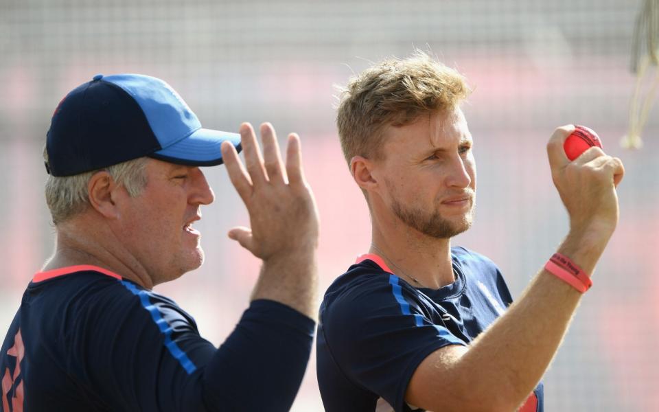 England captain Joe Root with spin bowling coach Stuart MacGill gets to grips with the pink Kookaburra  - Getty Images AsiaPac