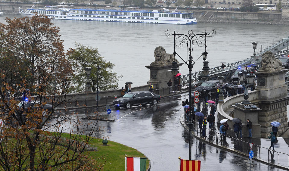 A convoy transporting Russian President Vladimir Putin arrives in central Budapest, Hungary, Wednesday, Oct. 30, 2019. Putin is on an official visit to Hungary. (Lajos Soos/MTI via AP)