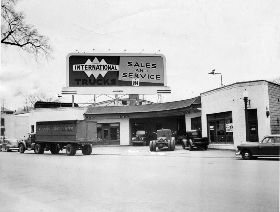 International Harvester was a neighbor of the Webster Square Arena, its arched roof visible just below the billboard.
