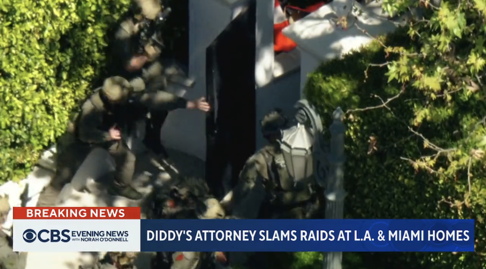 Agents entering Diddy's property with CBS Evening News chyron