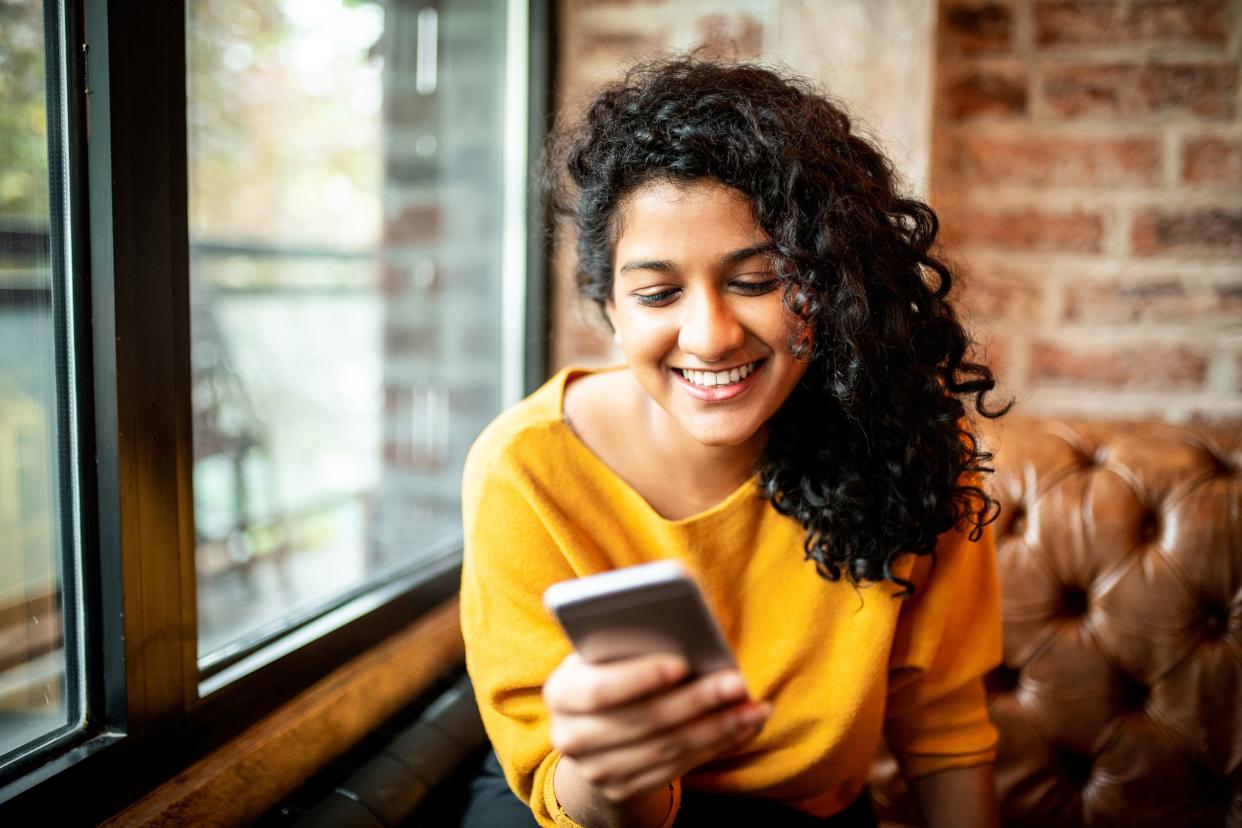 young woman using mobile phone