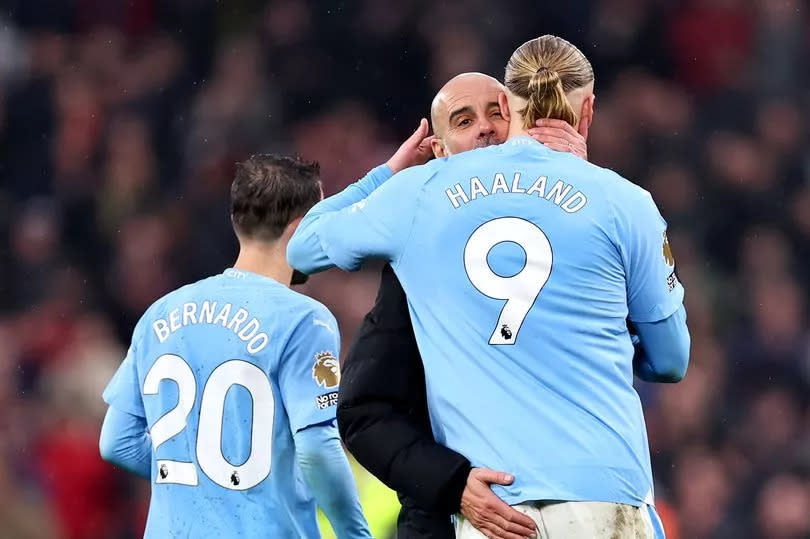 Bernardo Silva, Pep Guardiola and Erling Haaland of Manchester City.