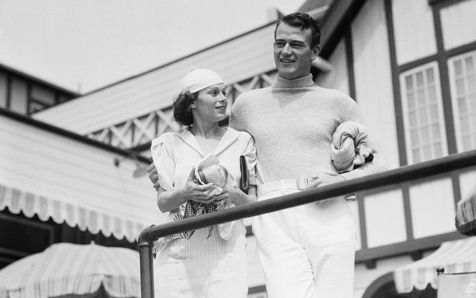 Wayne with his first wife, Josephine, at their home in Santa Monica - Bettmann Archive