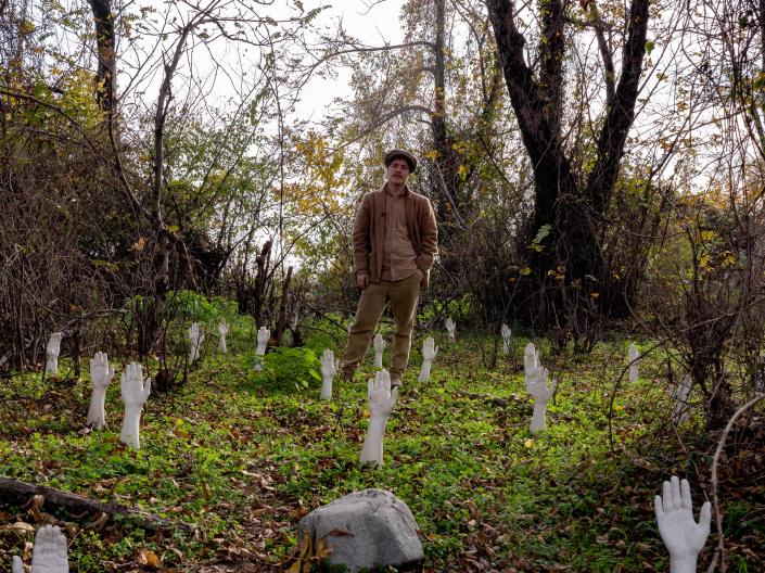 Chateau Chapiteau founder Vanya Mitin stands amid an art installation on the grounds of the commune a few hours northeast of Tbilisi, Georgia.