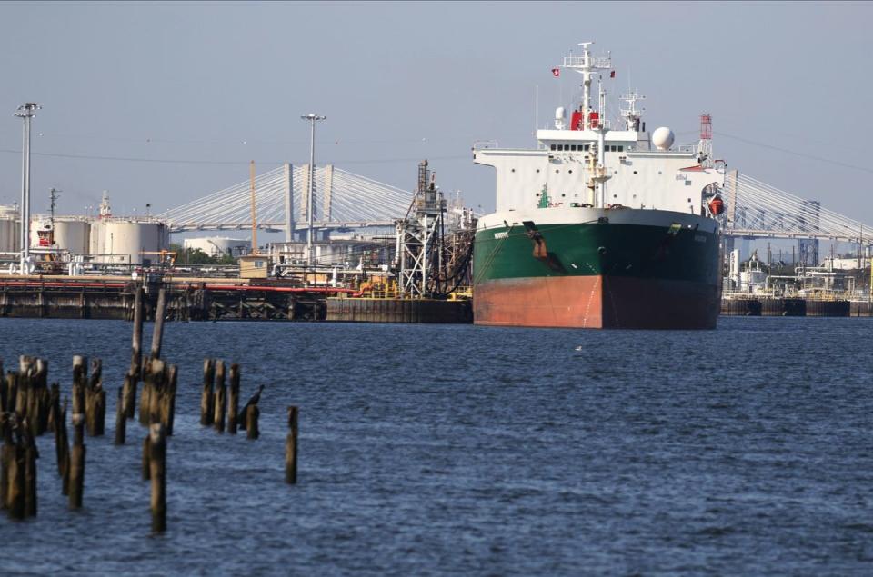 An oil tanker docked in Linden by one of the many tank farms along the Arthur Kill. The Goethals Bridge is in the background. It is part of the Arthur Kill, a water passage between Staten Island, NY and industrial New Jersey is an area where an attempt at balance is sought between industrial commerce, recreation and the preservation of nature.