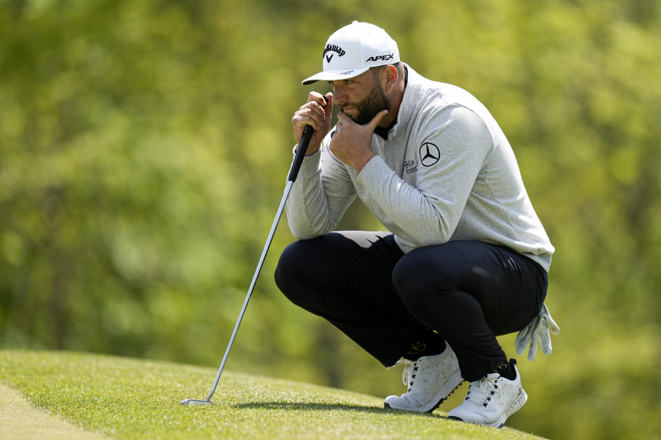 Jon Rahm, of Spain, lines up a putt on the 14th hole during the first round of the PGA Championship golf tournament at Oak Hill Country Club on Thursday, May 18, 2023, in Pittsford, N.Y. (AP Photo/Eric Gay)