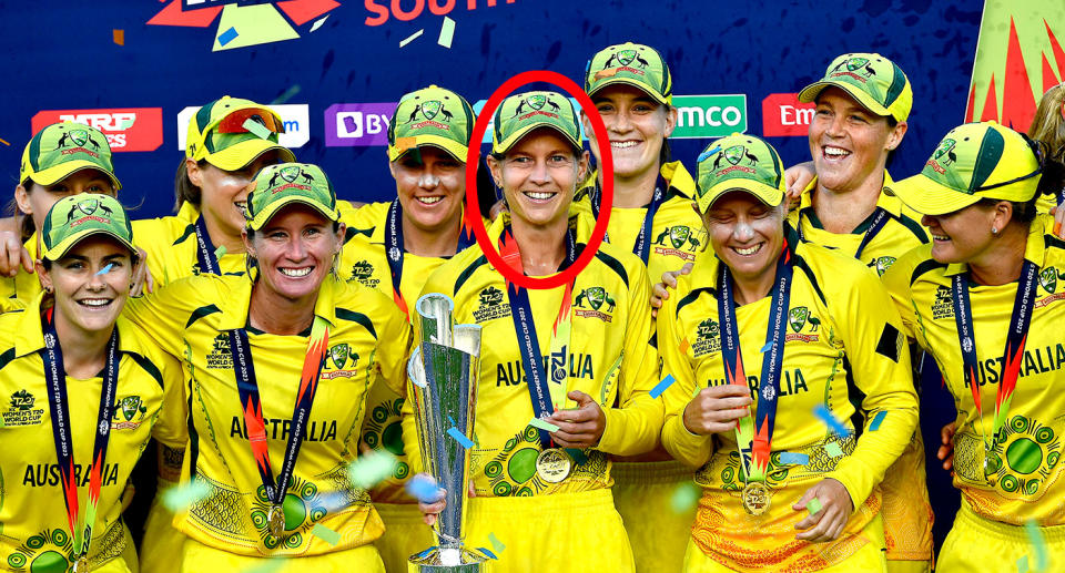 Pictured centre, Meg Lanning holds the T20 Women's World Cup trophy aloft.