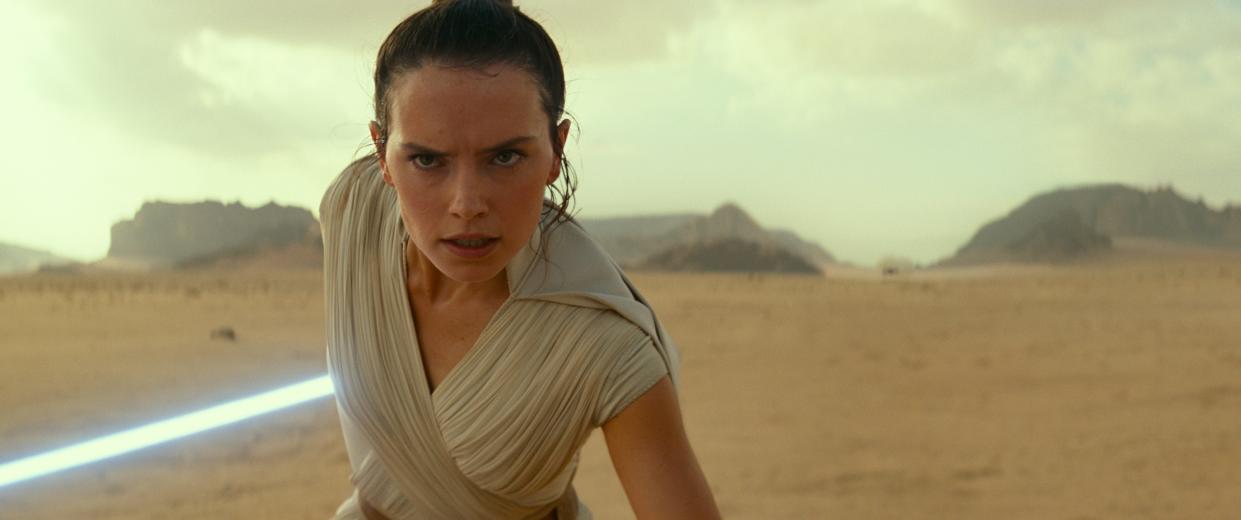 Daisy Ridley is returning as her lightsaber-wielding warrior Rey in a new "Star Wars" movie.