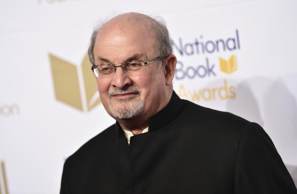 Salman Rushdie smiles at a 2017 awards ceremony.